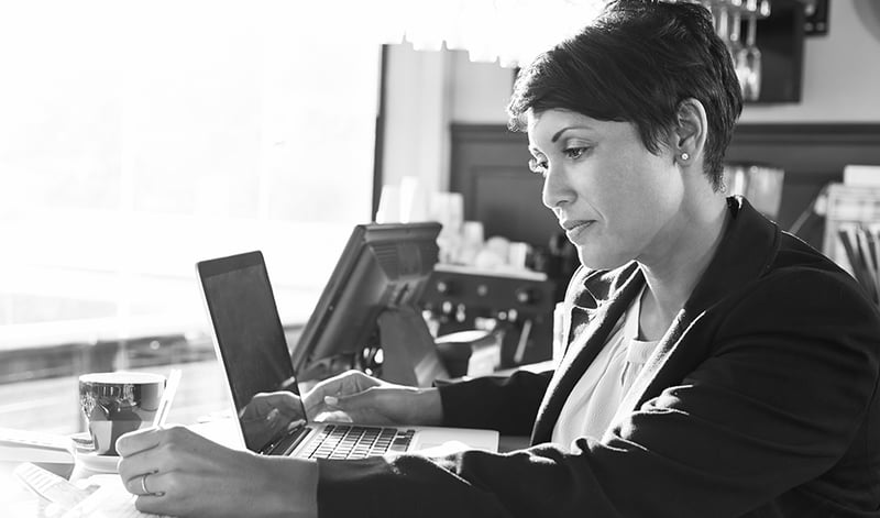 Female manager working at counter